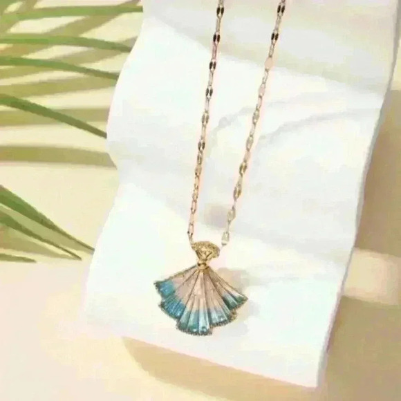 Delicate Fan-Shaped Pendant Accented with Shimmering Blue Hues - Picture 2 of 6